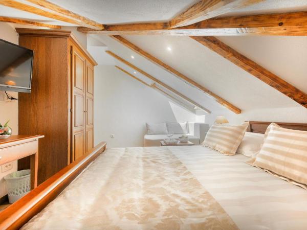 Villa Trau d`oro : photo 4 de la chambre chambre triple mansardée