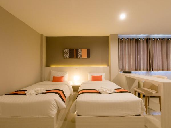 De Hug Hotel & Residence : photo 2 de la chambre grand hébergement lits jumeaux deluxe