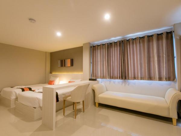 De Hug Hotel & Residence : photo 3 de la chambre grand hébergement lits jumeaux deluxe