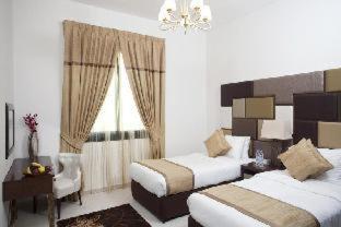 Al Waleed Holiday Homes : photo 1 de la chambre room #7161621