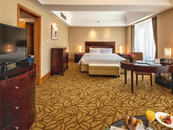 Furama Hotel Dalian : photo 1 de la chambre deluxe business king size bed room - east room