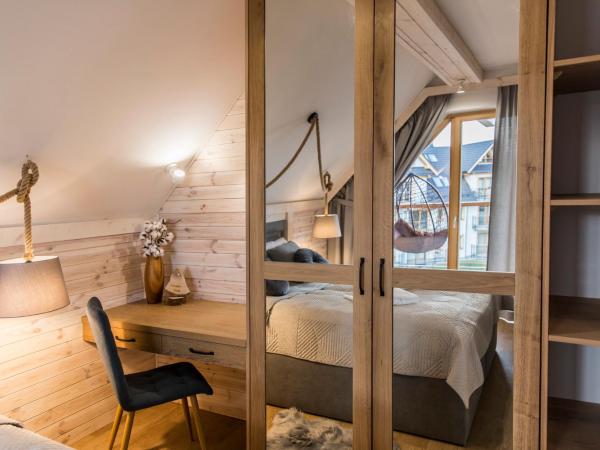 APARTHOTEL ROYAL RESORT SPA Zakopane : photo 3 de la chambre appartement 2 chambres harry potter