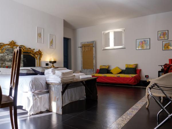 B&B SEKELES Suites and Spa : photo 4 de la chambre chambre triple avec terrasse