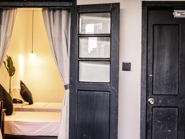 The Marian Boutique Lodging House : photo 2 de la chambre chambre lits jumeaux - vue sur piscine