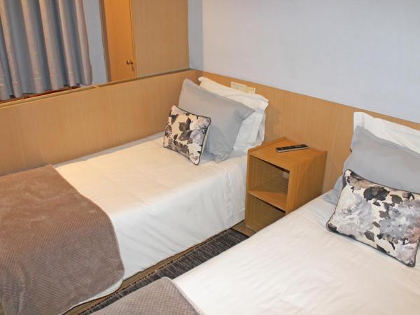 Residencial Paranhos : photo 1 de la chambre chambre lits jumeaux