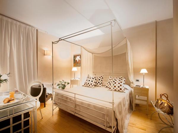 Hotel Mastino : photo 2 de la chambre chambre quadruple