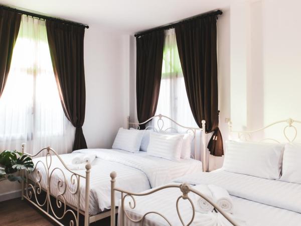 Nidhra Lanna Hotel : photo 6 de la chambre chambre familiale deluxe