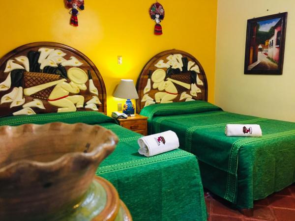 Hotel Cazomalli Oaxaca : photo 7 de la chambre chambre double avec 2 lits doubles