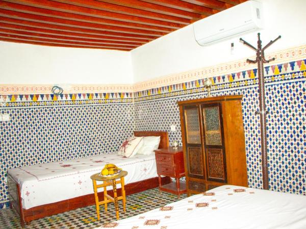 Riad Dar Senhaji : photo 7 de la chambre chambre double deluxe (2 adultes + 1 enfant)