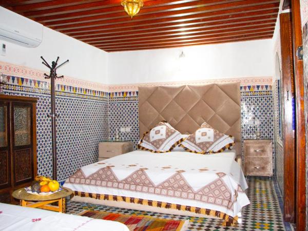 Riad Dar Senhaji : photo 1 de la chambre chambre double deluxe (2 adultes + 1 enfant)
