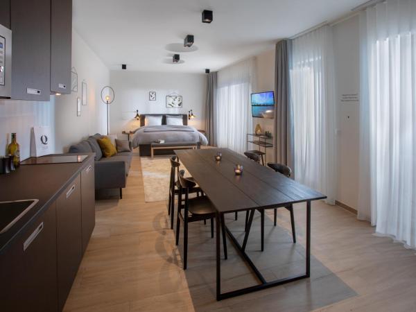 Qstay Good Living Apartments : photo 1 de la chambre appartement - rez-de-chaussée