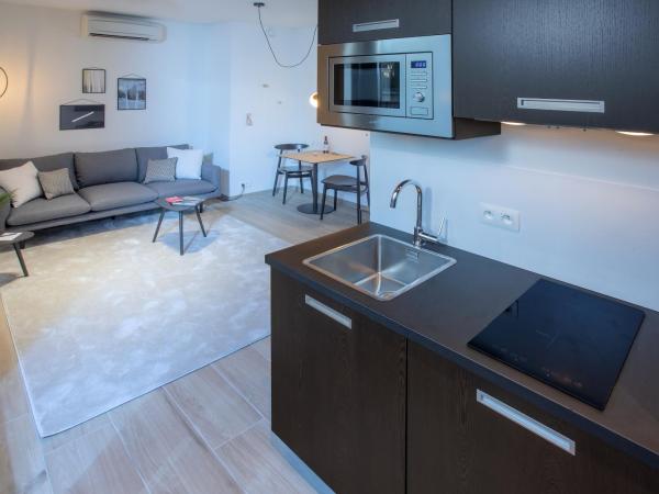 Qstay Good Living Apartments : photo 2 de la chambre penthouse