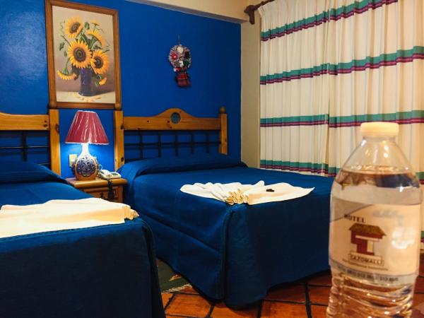 Hotel Cazomalli Oaxaca : photo 1 de la chambre chambre double avec 2 lits doubles