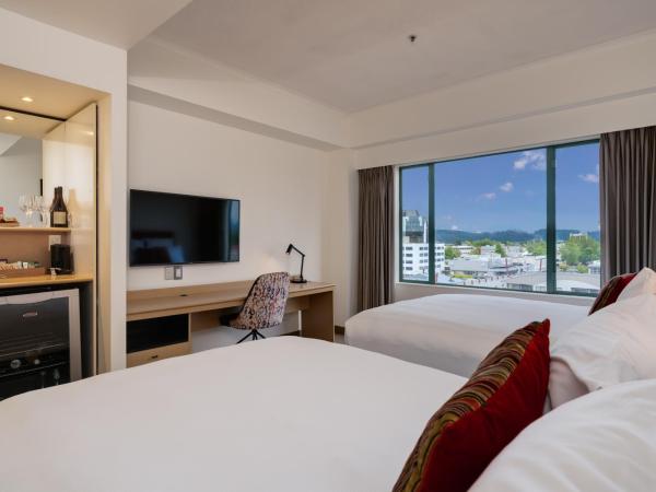 Novotel Rotorua Lakeside : photo 2 de la chambre chambre lits jumeaux supérieure avec 2 lits doubles