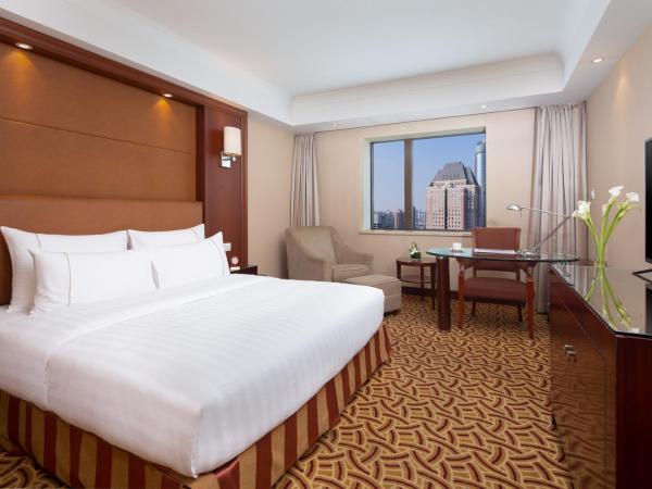 Jianguo Hotel Shanghai : photo 2 de la chambre chambre lit king-size deluxe