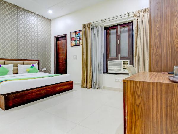 Treebo M2M Residency Sector 46 : photo 5 de la chambre chambre double deluxe