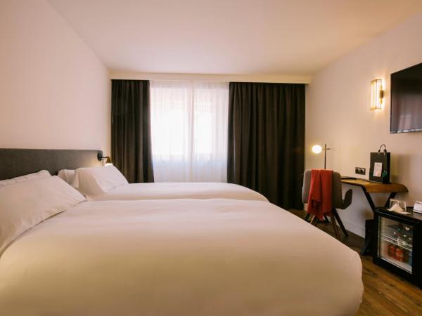 Yomo Centric : photo 4 de la chambre chambre familiale lits jumeaux