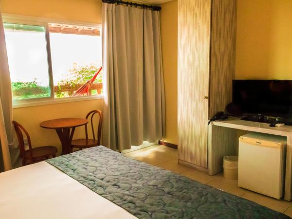 Farol de Itapuã Praia Hotel : photo 1 de la chambre chambre double exécutive