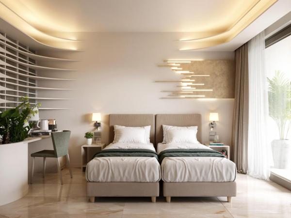 Green Suites Boutique Hotel : photo 8 de la chambre chambre premium king ou lits jumeaux