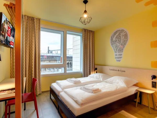 MEININGER Hotel Lyon Centre Berthelot : photo 1 de la chambre chambre lits jumeaux standard