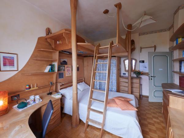 Le Balze Camere in Villa : photo 2 de la chambre chambre lit queen-size - vue sur jardin