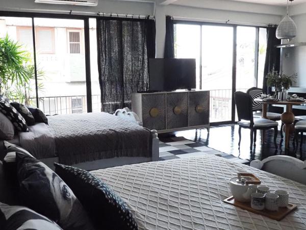 NIL BKK : photo 10 de la chambre suite familiale avec balcon