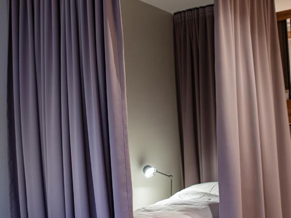 Roomie Alps Design Hostel : photo 1 de la chambre lit simple en dortoir féminin (8 adultes) 