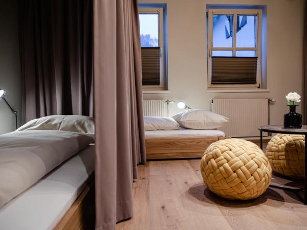 Roomie Alps Design Hostel : photo 7 de la chambre lit simple en dortoir féminin (8 adultes) 