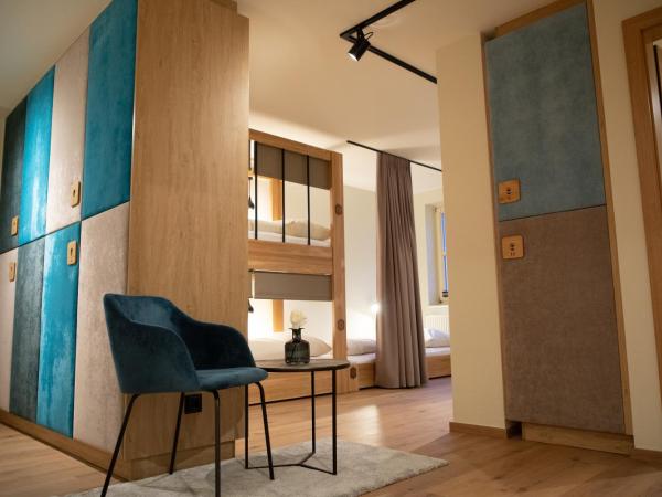Roomie Alps Design Hostel : photo 9 de la chambre lit simple dans dortoir de 10 lits