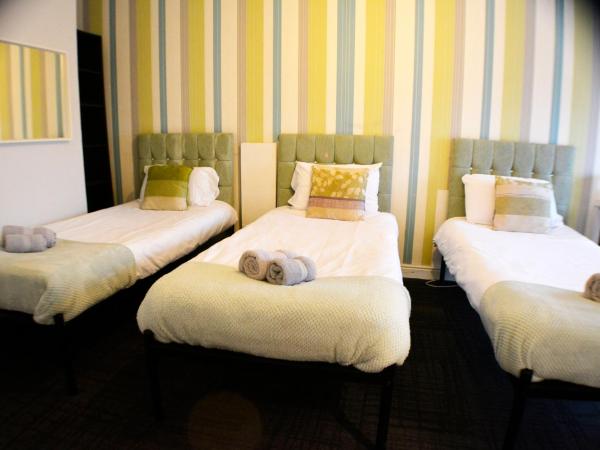 Queens Guesthouse Manchester : photo 5 de la chambre chambre triple confort