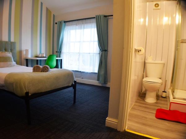 Queens Guesthouse Manchester : photo 3 de la chambre chambre triple confort