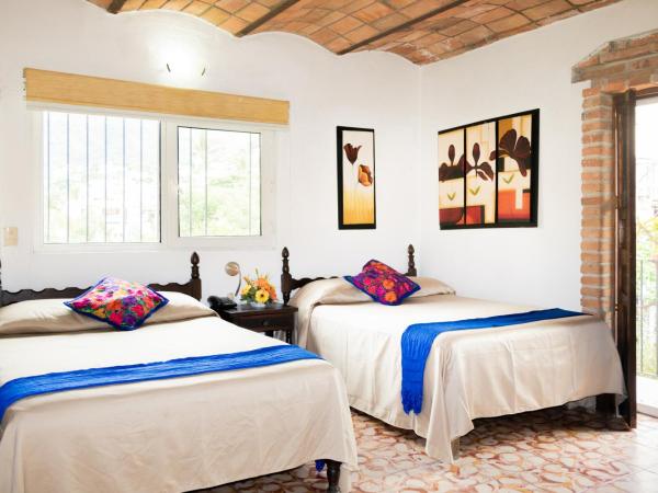 Hotel Posada De Roger : photo 1 de la chambre chambre double avec 2 lits doubles