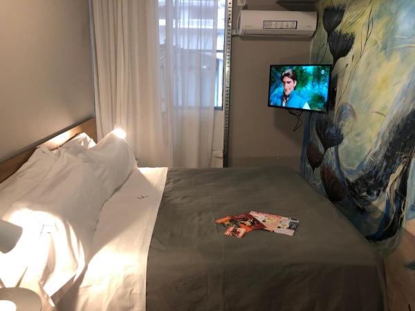 Franca City Hostel : photo 1 de la chambre chambre double avec salle de bains commune