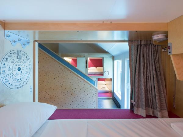 Pangea Pod Hotel : photo 2 de la chambre capsule simple – entrée latérale