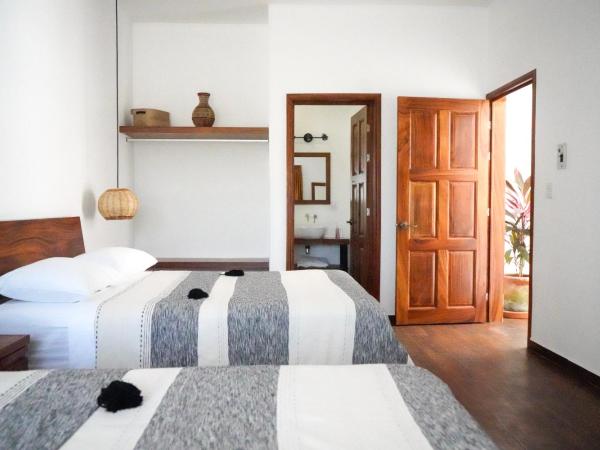 Casa Beu : photo 4 de la chambre chambre avec 2 grands lits queen-size 