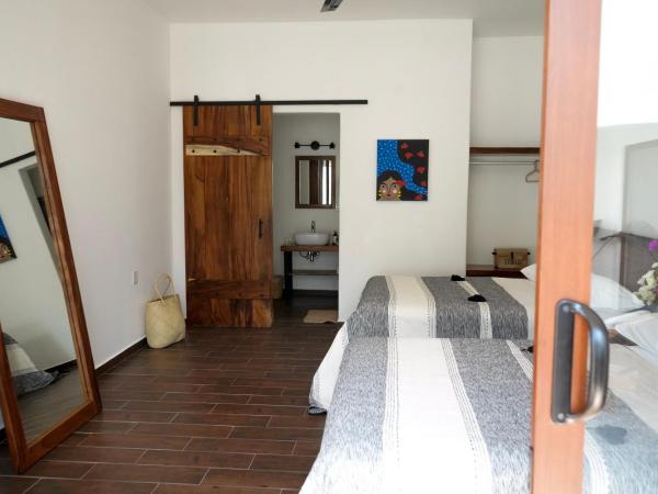 Casa Beu : photo 6 de la chambre chambre avec 2 grands lits queen-size 