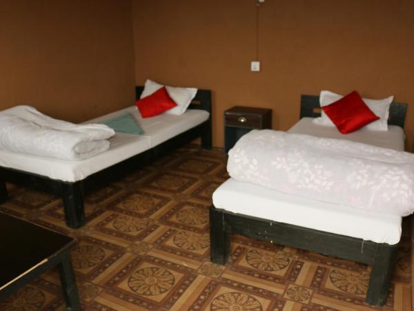 peace guesthouse cottage : photo 8 de la chambre chambre lits jumeaux Économique