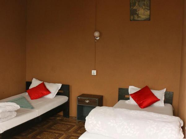 peace guesthouse cottage : photo 10 de la chambre chambre lits jumeaux Économique