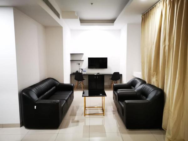 Parkside Plaza Muscat : photo 8 de la chambre chambre lit king-size deluxe