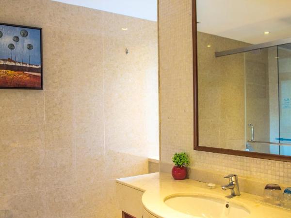 Sanya Seacube Holiday Hotel : photo 1 de la chambre chambre lit king-size ou lits jumeaux supérieure - vue sur jardin