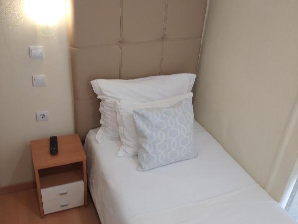 Pensao Estacao Central : photo 2 de la chambre chambre simple