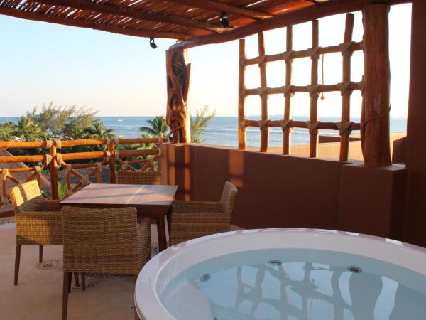 Hotel Beló Isla Mujeres - All Inclusive : photo 8 de la chambre suite présidentielle belo avec 1 lit king-size - vue sur océan