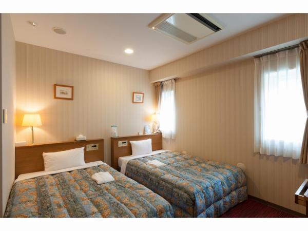 Benikea Calton Hotel Fukuoka Tenjin : photo 1 de la chambre chambre lits jumeaux de luxe - non-fumeurs