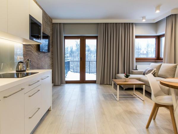 Royal Hill Residence : photo 5 de la chambre appartement supérieur avec terrasse - vue sur montagne