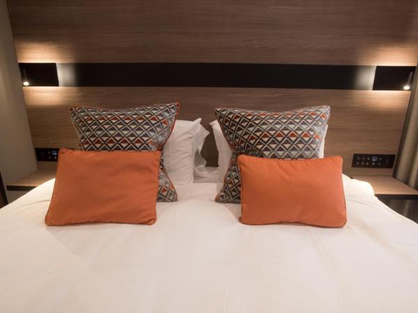 Merit Kensington Hotel : photo 1 de la chambre chambre double ou lits jumeaux supérieure