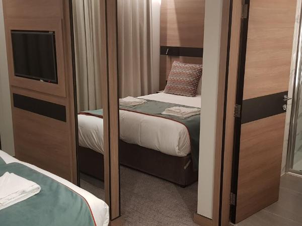 Merit Kensington Hotel : photo 5 de la chambre chambre quadruple supérieure