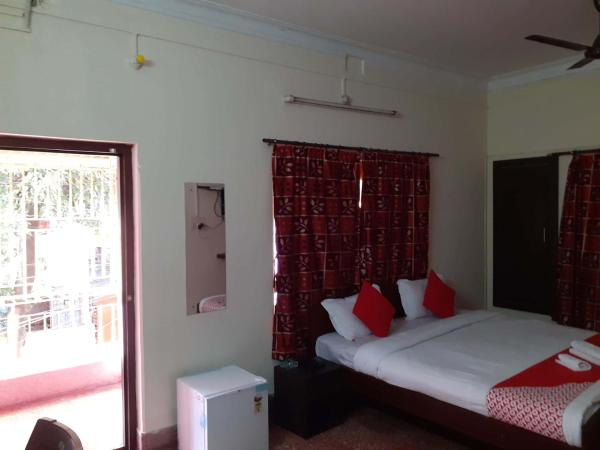 Lake Town Guest House : photo 8 de la chambre chambre lit king-size avec balcon