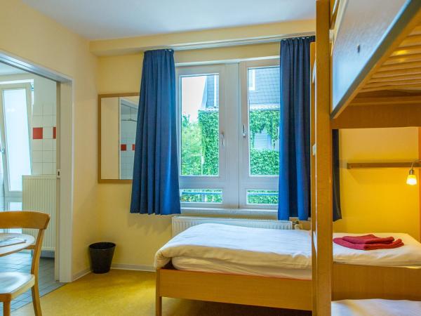 Schanzenstern Altona GmbH : photo 2 de la chambre chambre triple - accessible aux personnes à mobilité réduite