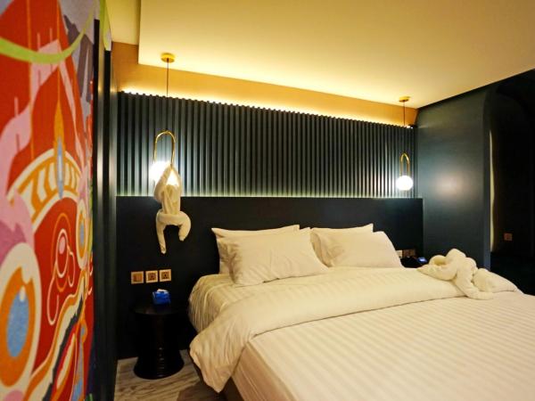 4 Monkeys Hotel : photo 2 de la chambre chambre lit king-size deluxe