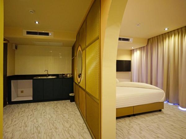 4 Monkeys Hotel : photo 4 de la chambre suite avec baignoire spa